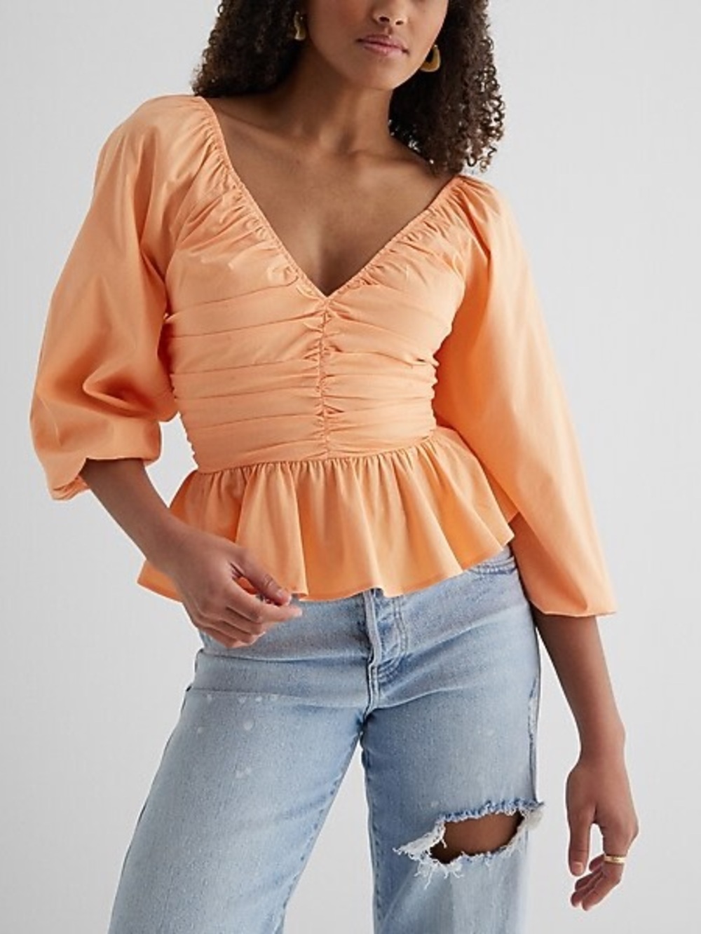 Orange V-Neck Pleated Peplum Top